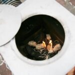 07.02.2021. Kielce. Pokaz rozpalania ognia w domowych paleniskach / Wiktor Taszłow / Radio Kielce