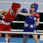 13.04.2021. Kielce. Młodzieżowe Mistrzostwa Świata Kobiet i Mężczyzn w Boksie. Na zdjęciu: walka 1/16 finału 54kg: Karolina Ampulska (Polska) (niebieski strój) vs. Vilte Savickaite (Litwa) / Jarosław Kubalski / Radio Kielce