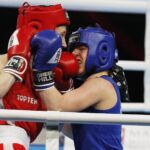 13.04.2021. Kielce. Młodzieżowe Mistrzostwa Świata Kobiet i Mężczyzn w Boksie. Na zdjęciu: walka 1/16 finału 54kg: Karolina Ampulska (Polska) (niebieski strój) vs. Vilte Savickaite (Litwa) / Jarosław Kubalski / Radio Kielce