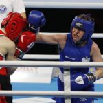 13.04.2021. Kielce. Młodzieżowe Mistrzostwa Świata Kobiet i Mężczyzn w Boksie. Na zdjęciu: walka 1/16 finału 54kg: Karolina Ampulska (Polska) (niebieski strój) vs. Vilte Savickaite (Litwa) / Jarosław Kubalski / Radio Kielce