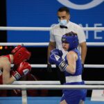 13.04.2021. Kielce. Młodzieżowe Mistrzostwa Świata Kobiet i Mężczyzn w Boksie. Na zdjęciu: walka 1/16 finału 54kg: Karolina Ampulska (Polska, niebieski strój) vs. Vilte Savickaite (Litwa) / Jarosław Kubalski / Radio Kielce