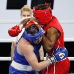 16.04.2021 Kielce. Młodzieżowe Mistrzostwa Świata Kobiet i Mężczyzn w Boksie. Walka: Jakub Domurad, Polska (niebieski strój) - Fernando Arzola Lopez, Kuba / Jarosław Kubalski / Radio Kielce