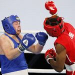 16.04.2021 Kielce. Młodzieżowe Mistrzostwa Świata Kobiet i Mężczyzn w Boksie. Walka: Jakub Domurad, Polska (niebieski strój) - Fernando Arzola Lopez, Kuba / Jarosław Kubalski / Radio Kielce