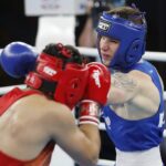 17.04.2021 Kielce. Młodzieżowe Mistrzostwa Świata Kobiet i Mężczyzn w Boksie. Walka:Oliwier Zamojski ( Polska, niebieski strój) - Ankit Narwal ( Indie) / Jarosław Kubalski / Radio Kielce