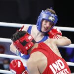 17.04.2021 Kielce. Młodzieżowe Mistrzostwa Świata Kobiet i Mężczyzn w Boksie. Walka:Oliwier Zamojski ( Polska, niebieski strój) - Ankit Narwal ( Indie) / Jarosław Kubalski / Radio Kielce