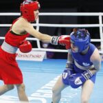 19.04.2021 Kielce. Młodzieżowe Mistrzostwa Świata Kobiet i Mężczyzn w Boksie. Walka: Dominika Karolina Ampulska ( Polska, niebieski strój) - Aishagul Yeleubayeva ( Kazachstan ) / Jarosław Kubalski / Radio Kielce