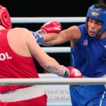 23.04.2021. Kielce. Finał kategorii ciężkiej Młodzieżowych Mistrzostw Świata Kobiet i Mężczyzn w Boksie. Na zdjęciu (od lewej): Jakub Straszewski i Jorge Luis Felimona Lobaina / Wiktor Taszłow / Radio Kielce