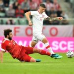 01.06.2021. Wrocław. Mecz towarzyski Polska - Rosja. Na zdjęciu (od lewej): Georgij Dżikija i Dawid Kownacki / PAP/Maciej Kulczyński