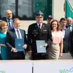 14.06.2021. Wręczenie promes na zakup nowoczesnych wozów strażackich i elektrycznych radiowozów. Na zdjęciu (od lewej): Krzysztof Słoń - senator PiS, Anna Krupka - wiceminister kultury, dziedzictwa narodowego i sportu, Grzegorz Socha - zastępca prezesa zarządu WFOŚiGW w Kielcach,  Ryszard Gliwiński - prezes zarządu WFOŚiGW w Kielcach, Krzysztof Ciosek - Świętokrzyski Komendant Wojewódzki PSP, Jarosław Tokarczyk - pierwszy zastępca komendanta Komendy Wojewódzkiej Policji w Kielcach, Agata Wojtyszek - poseł PiS, Bartłomiej Dorywalski - poseł PiS, Rafał Nowak - wicewojewoda świętokrzyski, Andrzej Kryj - poseł PiS / Wiktor Taszłow / Radio Kielce