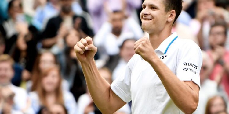07.07.2021. Wimbledon, Hubert Hurkacz po wygraniu meczu ćwierćfinałowego mężczyzn z Rogerem Federerem ze Szwajcarii / NEIL HALL / PAP/EPA