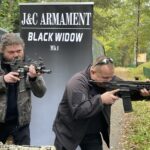 01.10.2021. Starachowice. Prezentacja karabinu Black Widow III. Na zdjęciu (od lewej): konstruktorzy Przemysław Jaworski i Rafał Cygański / Anna Głąb / Radio Kielce