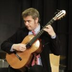 25.10.2021 Kielce. 75 lecie Zespołu Państwowych Szkół Muzycznych. Koncert Pedagogów. Wojciech Lipiński - gitara / Jarosław Kubalski / Radio Kielce