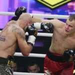 04.12.2021. Kielce. Suzuki Boxing Night X. Walka wieczoru: Michał Łoniewski - Daniel Adamiec (w czerwonych spodenkach) / Wiktor Taszłow / Radio Kielce