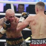 04.12.2021. Kielce. Suzuki Boxing Night X. Walka wieczoru: Michał Łoniewski - Daniel Adamiec (w czerwonych spodenkach) / Wiktor Taszłow / Radio Kielce