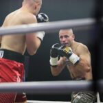 04.12.2021. Kielce. Suzuki Boxing Night X. Walka wieczoru: Michał Łoniewski - Daniel Adamiec (w czerwonych spodenkach) / Wiktor Taszłow / Radio Kielce