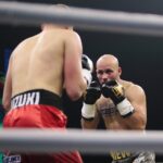04.12.2021. Kielce. Suzuki Boxing Night X. Walka wieczoru: Michał Łoniewski - Daniel Adamiec (w czerwonych spodenkach) / Wiktor Taszłow / Radio Kielce