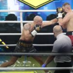 04.12.2021. Kielce. Suzuki Boxing Night X. Walka wieczoru: Michał Łoniewski - Daniel Adamiec (w czerwonych spodenkach) / Wiktor Taszłow / Radio Kielce