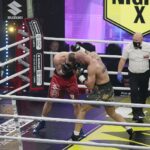 04.12.2021. Kielce. Suzuki Boxing Night X. Walka wieczoru: Michał Łoniewski - Daniel Adamiec (w czerwonych spodenkach) / Wiktor Taszłow / Radio Kielce