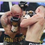 04.12.2021. Kielce. Suzuki Boxing Night X. Walka wieczoru: Michał Łoniewski (z lewej) - Daniel Adamiec / Wiktor Taszłow / Radio Kielce