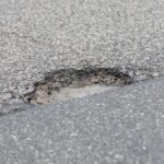 21.01.2022. Dziury w jezdni. Ulica Skrzetlewska / Wiktor Taszłow / Radio Kielce