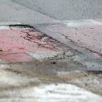 21.01.2022. Dziury w jezdni. Ulica Łódzka / Wiktor Taszłow / Radio Kielce