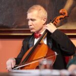 22.01.2022. Sandomierz. Koncert charytatywny dla Bartusia Przychodzkiego. Na zdjęciu: Jacek Hodur - wiolonczela / Wiktor Taszłow / Radio Kielce