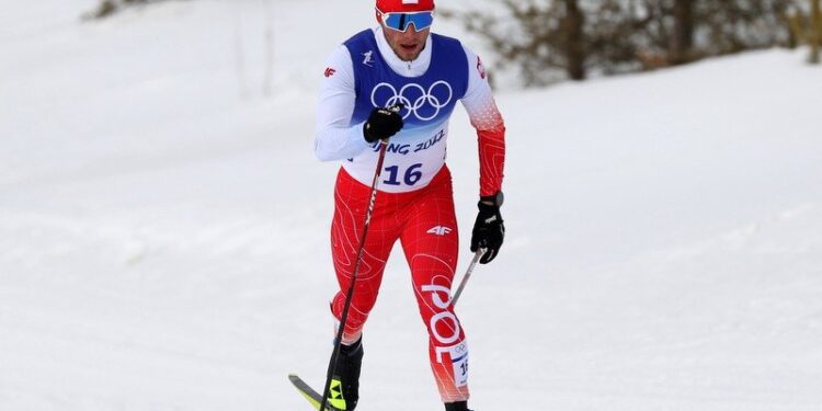 11.02.2022. Zimowe Igrzyska Olimpijskie Pekin 2022. Na zdjęciu: Dominik Bury podczas biegu klasycznego mężczyzn na 15 km / PAP/EPA/JEON HEON-KYUN