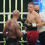04.12.2021. Kielce. Suzuki Boxing Night X. Walka wieczoru: Michał Łoniewski - Daniel Adamiec (w czerwonych spodenkach) / Wiktor Taszłow / Radio Kielce