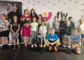 13.06.2022. Kielce. Na zdjęciu (w środku): Anna Krupka - wiceminister sportu i turystyki i Sandra Drabik wraz z uczestnikami zajęć / Rafał Szymczyk / Radio Kielce