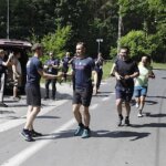11.06.2022. Kielce. Impreza „Endorfiny dla Maliny – charytatywny festyn i bieg na 200 km w Kielcach”. Na zdjęciu (w środku): Marcin Długosz - pomysłodawca wydarzenia / Jarosław Kubalski / Radio Kielce