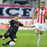 23.07.2022. 2. kolejka PKO BP Ekstraklasy: Cracovia - Korona Kielce. Na zdjęciu (od lewej): Grzegorz Szymusik - Korona Kielce i Kamil Pestka - Cracovia Kraków / Fot. Łukasz Gągulski - PAP