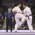 25.09.2022. Kielce. Finałowe walki VII Mistrzostw Świata Karate w Kategoriach Wagowych. Na zdjęciu: Riri Ishihara - Japonia, Ruta Brazdzionyte - Litwa / Fot. Wiktor Taszłow - Radio Kielce