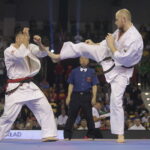 25.09.2022. Kielce. Finałowe walki VII Mistrzostw Świata Karate w Kategoriach Wagowych. Na zdjęciu: Nariyoshi Tada - Japonia, Juras Sokolovas - Litwa / Fot. Wiktor Taszłow - Radio Kielce