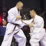 25.09.2022. Kielce. Finałowe walki VII Mistrzostw Świata Karate w Kategoriach Wagowych. Na zdjęciu: Nariyoshi Tada - Japonia, Juras Sokolovas - Litwa / Fot. Wiktor Taszłow - Radio Kielce