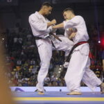 25.09.2022. Kielce. Finałowe walki VII Mistrzostw Świata Karate w Kategoriach Wagowych. Na zdjęciu: Eventas Guzauskas - Litwa, Maciej Mazur - Polska / Fot. Wiktor Taszłow - Radio Kielce