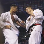 25.09.2022. Kielce. Finałowe walki VII Mistrzostw Świata Karate w Kategoriach Wagowych. Na zdjęciu: Eventas Guzauskas - Litwa, Maciej Mazur - Polska / Fot. Wiktor Taszłow - Radio Kielce