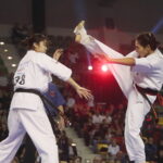24.09.2022. Kielce. Mistrzostwa Świata Karate w Kategoriach Wagowych. Na zdjęciu: Camille Haddouche - Francja, Ramu Amikawa - Japonia / Fot. Wiktor Taszłow - Radio Kielce