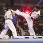 24.09.2022. Kielce. Mistrzostwa Świata Karate w Kategoriach Wagowych. Na zdjęciu: Camille Haddouche - Francja, Ramu Amikawa - Japonia / Fot. Wiktor Taszłow - Radio Kielce