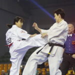 24.09.2022. Kielce. Mistrzostwa Świata Karate w Kategoriach Wagowych. Na zdjęciu: Yuna Mokudai - Japonia, Anna Bojda - Polska / Fot. Wiktor Taszłow - Radio Kielce