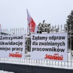 Na zdjęciu: transparenty przed biurowcem głównym MAN Bus / Fot. Anna Głąb - Radio Kielce