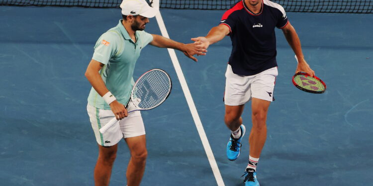 28.01.2023. Australian Open. Na zdjęciu Jan Zieliński i Hugo Nys. / Fot. FAZRY ISMAIL - PAP/EPA.