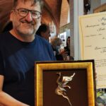 Na zdjęciu: Mirosław Osip-Pokrywka – autor albumu „Lwów i ziemia lwowska tom 1 i 2” z nagrodą Feniksa / Fot. wydawnictwo Jedność