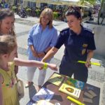 Kolorowanki od straży miejskiej - Radio Kielce 02.08.2023. Kielce. Obchody dnia kolorowanki / Fot. Marcin Marszałek - Radio Kielce