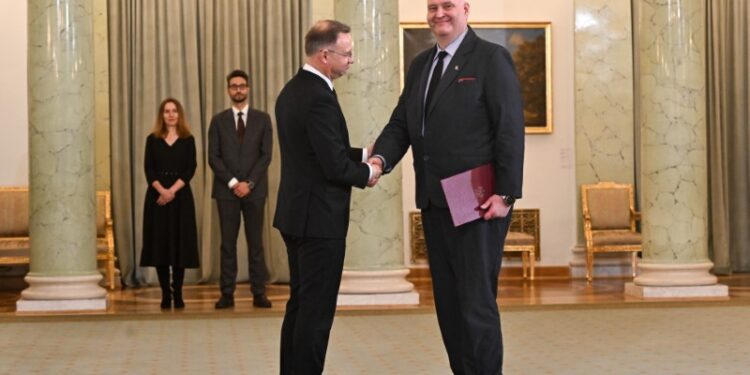 09.12.2024. Warszawa. Prezydent RP Andrzej Duda i Bogdan Święczkowski - prezes Trybunału Konstytucyjnego. Fot. PAP/Radek Pietruszka