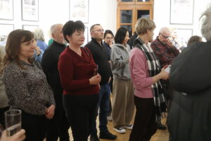 08.01.2025. Kielce. Wernisaż wystawy fotografii Mariusza Uciga " Kielce na starej i nowej fotografii" / Fot. Wiktor Taszłow - Radio Kielce