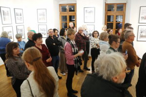 08.01.2025. Kielce. Wernisaż wystawy fotografii Mariusza Uciga " Kielce na starej i nowej fotografii" / Fot. Wiktor Taszłow - Radio Kielce