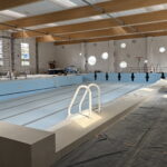 Ze zgliszcz, jak feniks z popiołów. Raport z odbudowy pływalni - Radio Kielce